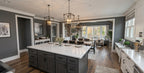 CL-20-014 Wexford farmhouse kitchen island and great room interior rendering.