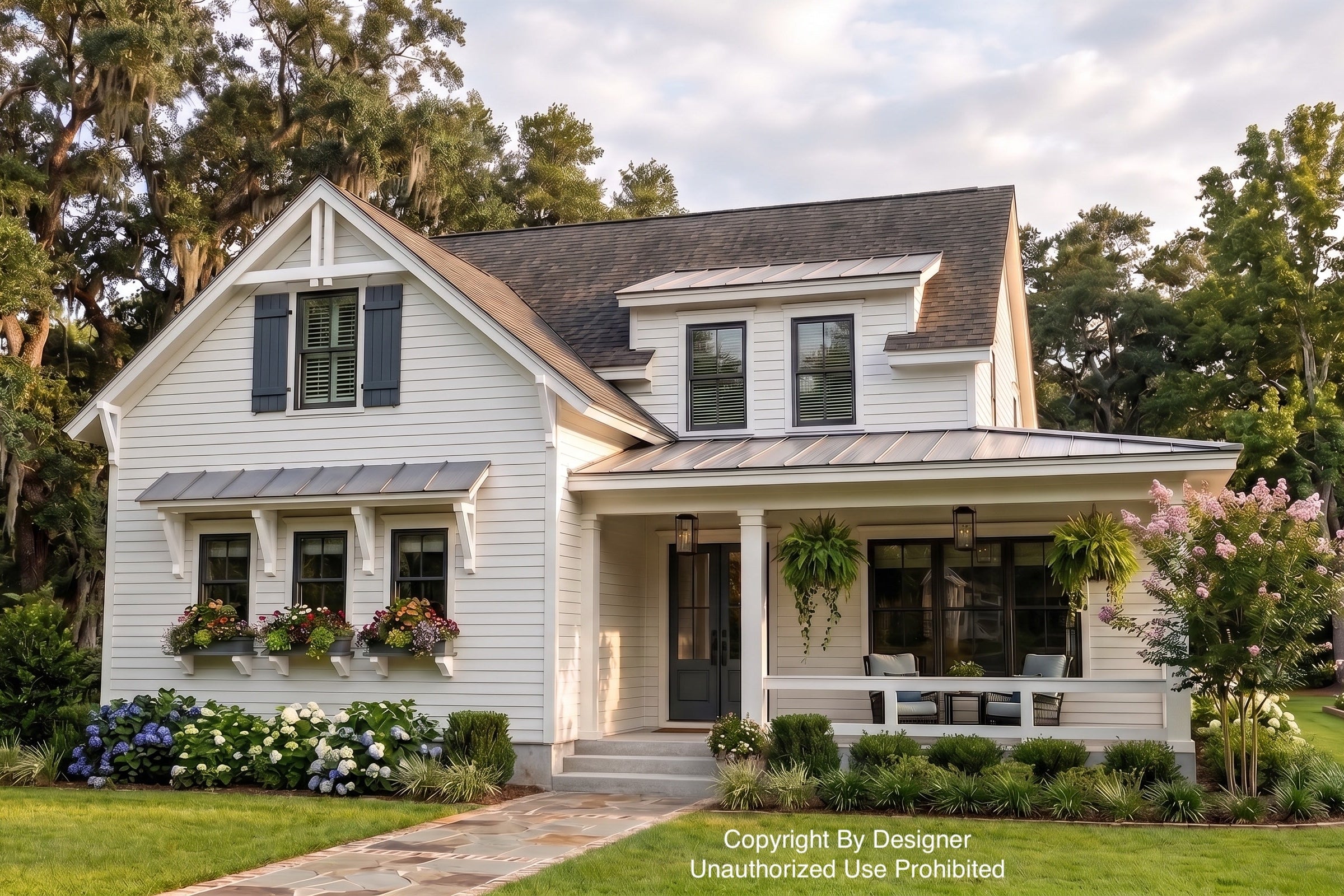 A white two-story cottage-style house with a dark gray shingled roof, front porch with columns, flower boxes, and a landscaped lawn, surrounded by tall trees.