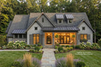 Stylish house with a well-maintained garden and pathway.