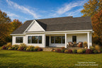 Alder Glen rear exterior with white siding, a covered porch and a projecting dining room overlooking the lawn.