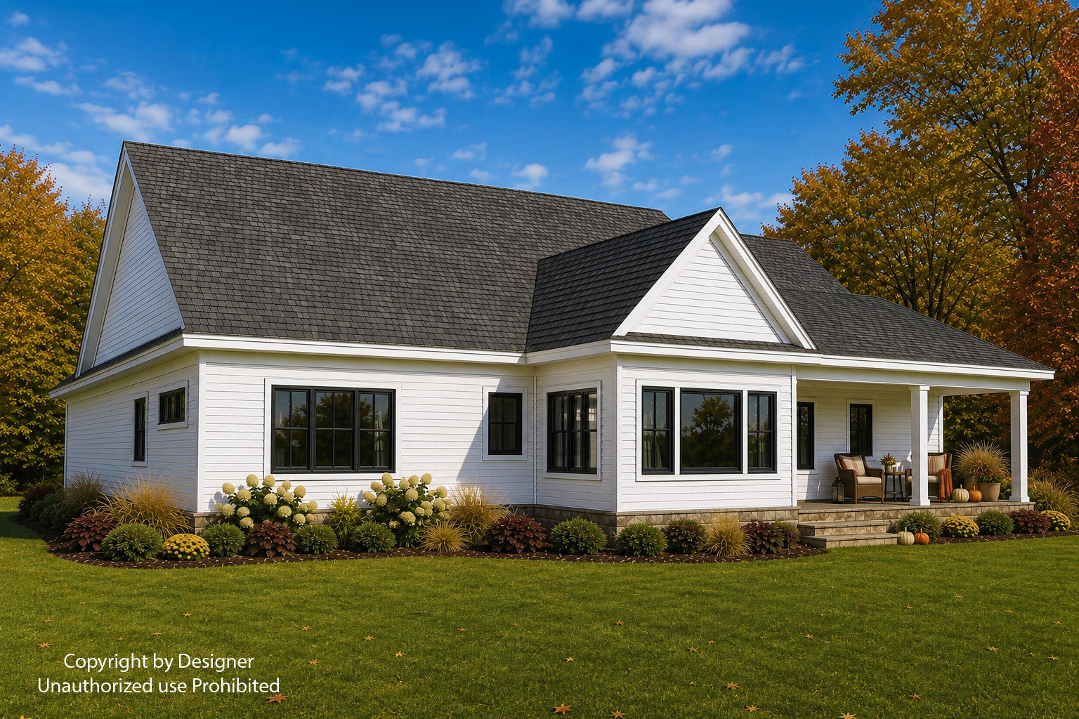Angled rear view of Alder Glen with white siding, black-framed windows, a covered porch and autumn landscaping.