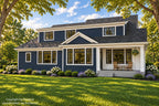 Rear exterior rendering with white trim, a gabled dining area and a covered porch facing the lawn.