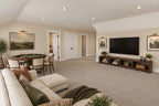 Upstairs-loft rendering with sofa seating, a television and a game table.