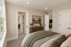 Upstairs-bedroom rendering with views toward the shared bathroom and loft.