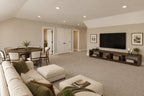 Upstairs-loft rendering with sofa seating, a television and a game table.