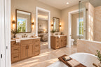 Primary bathroom with separate wood vanities, a freestanding tub and a glass shower, looking toward the bedroom.