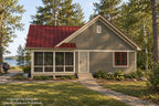 Right elevation rendering showing the screened porch, side-entry steps, horizontal siding and red gabled roof.