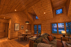 Family and dining room rendering highlighting the vaulted wood ceiling, high dormer windows and lake-facing windows.