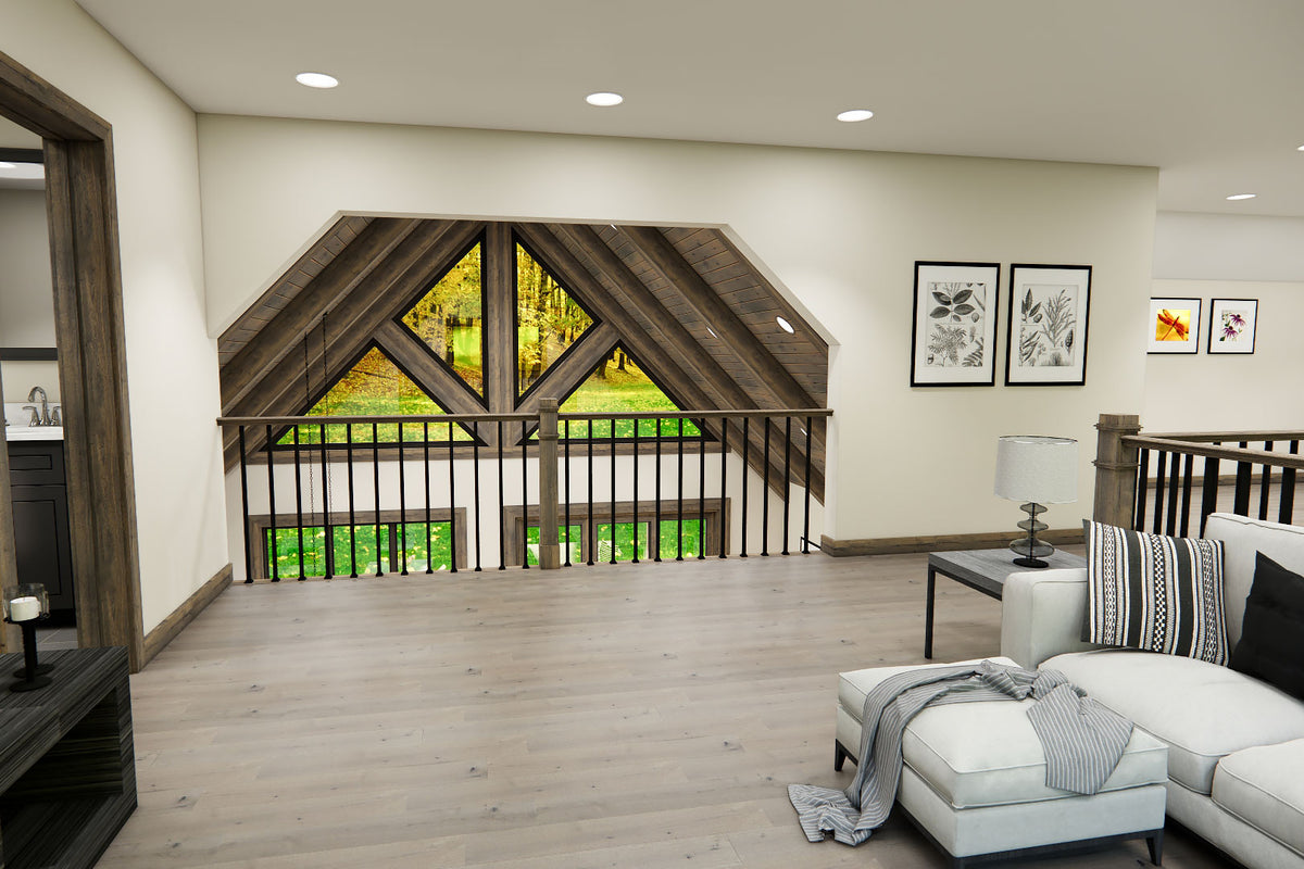 Upper loft rendering with sectional seating, an open railing and views through the great room gable windows.