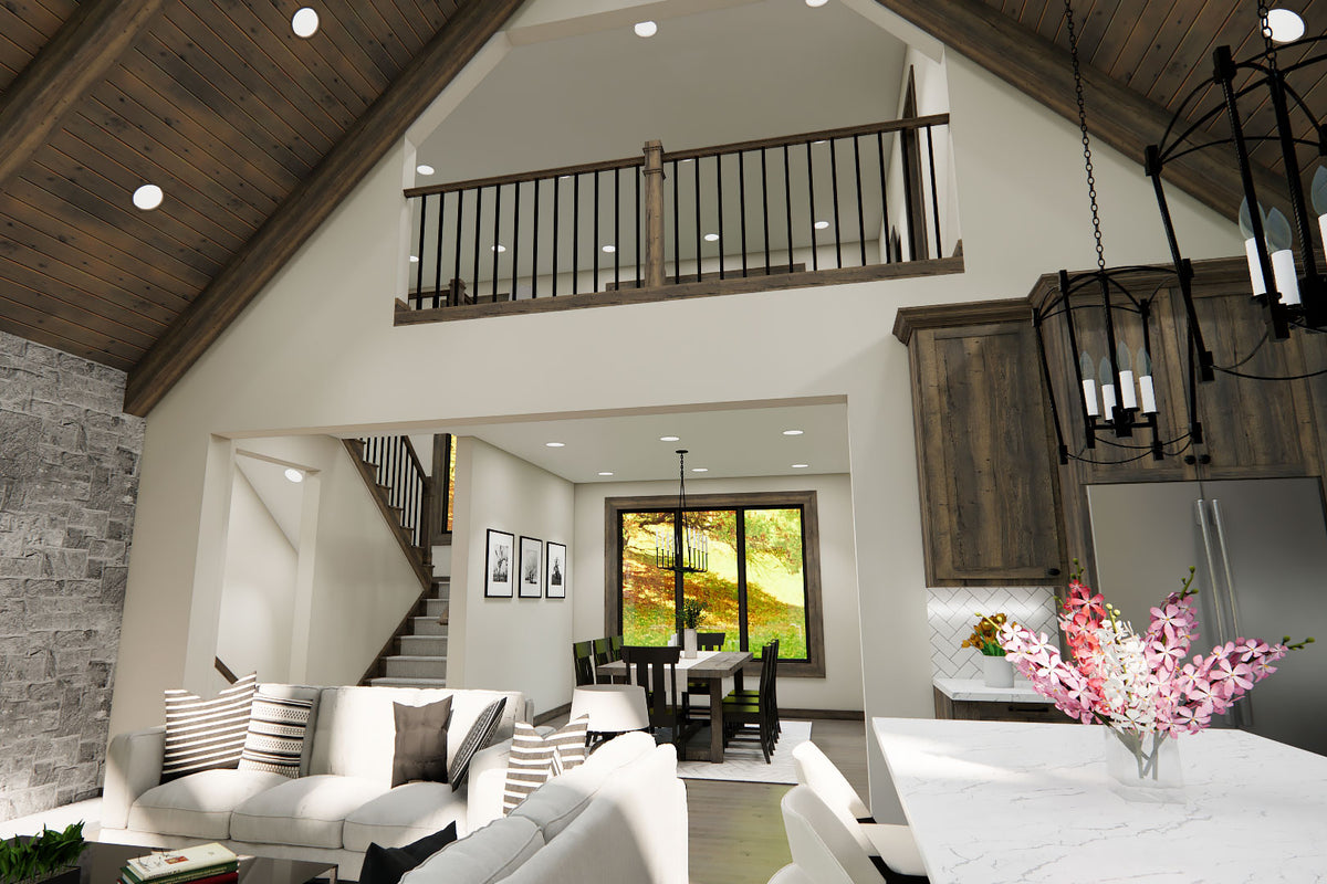 Great room rendering looking toward the stairs, dining area and loft railing beside the kitchen.
